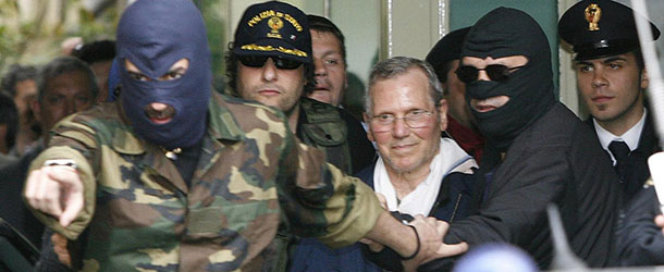 FILE-In-this-Tuesday-April-11-2006-file-photo-Mafia-boss-Bernardo-Provenzano-is-escorted-by-hooded-police-officers-as-he-enters-a-Police-building-in-downtown-Palermo-Italy.-AP-PhotoLuca-Bruno-File_Giuseppe_Ursino_blog